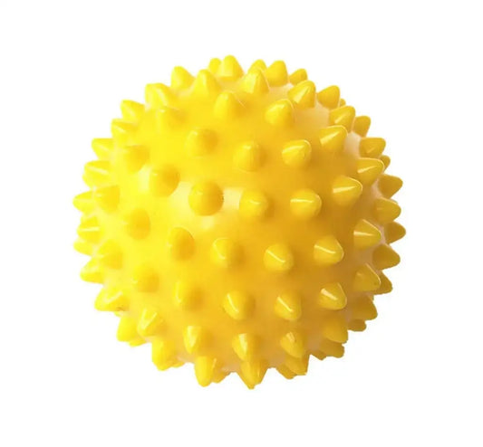 Yellow spiked massage ball with rubber nubs