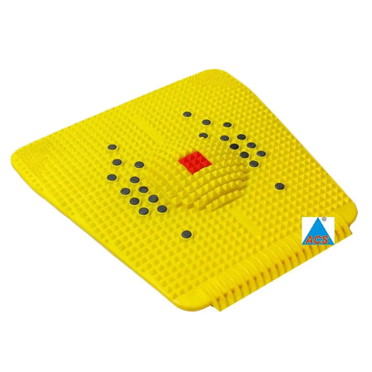 Acupressure magnetic foot mat, yellow textured surface with black dot nodes and red diamond