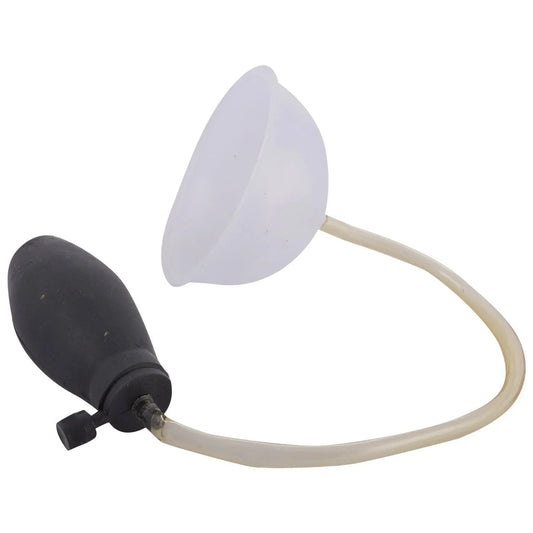 Nabhi acupressure pump with white suction cup and black bulb handle, connected tubing