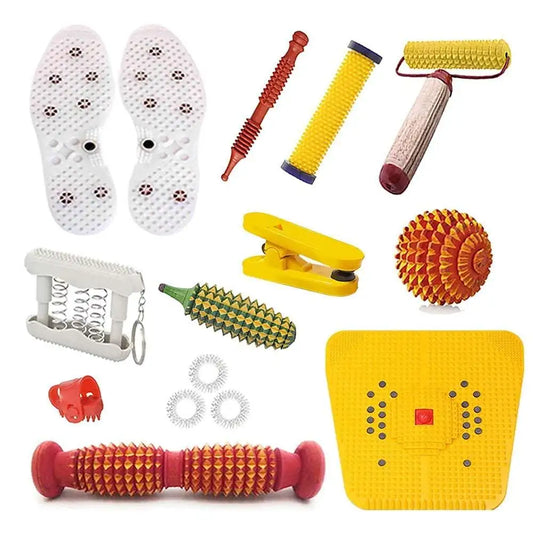 Acupressure tools combo kit with yellow mat, rollers, spiked discs, and white foot pads