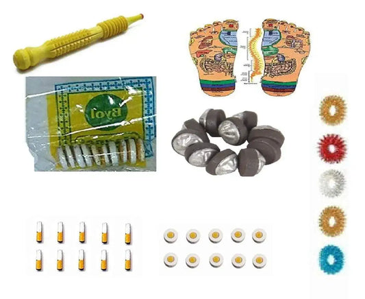 Chakra magnet set with round gray magnets and colored ring magnets, plus small yellow tool