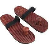 Brown wooden acupressure massage slippers with nodes for foot relief