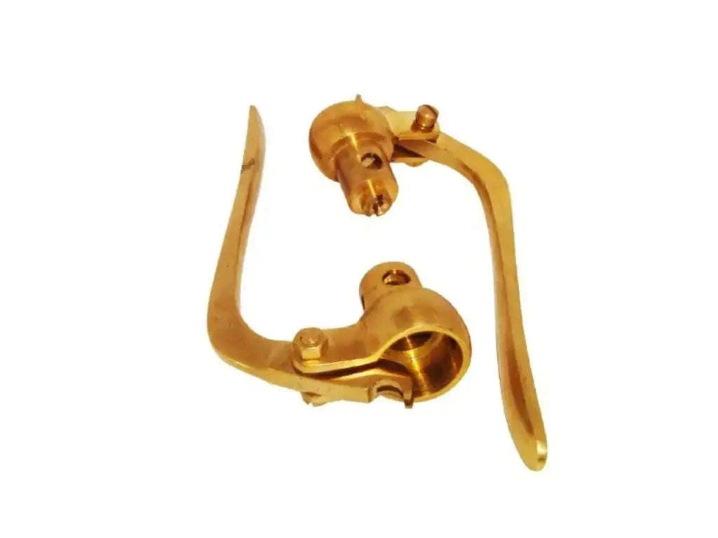 Vintage reverse lever pair in golden brass with mounting plates and lever handles