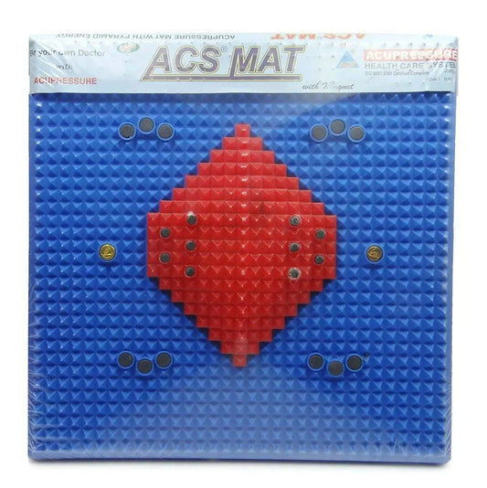 Acupressure mat with red center pad and copper-tone pressure nodes, blue cover