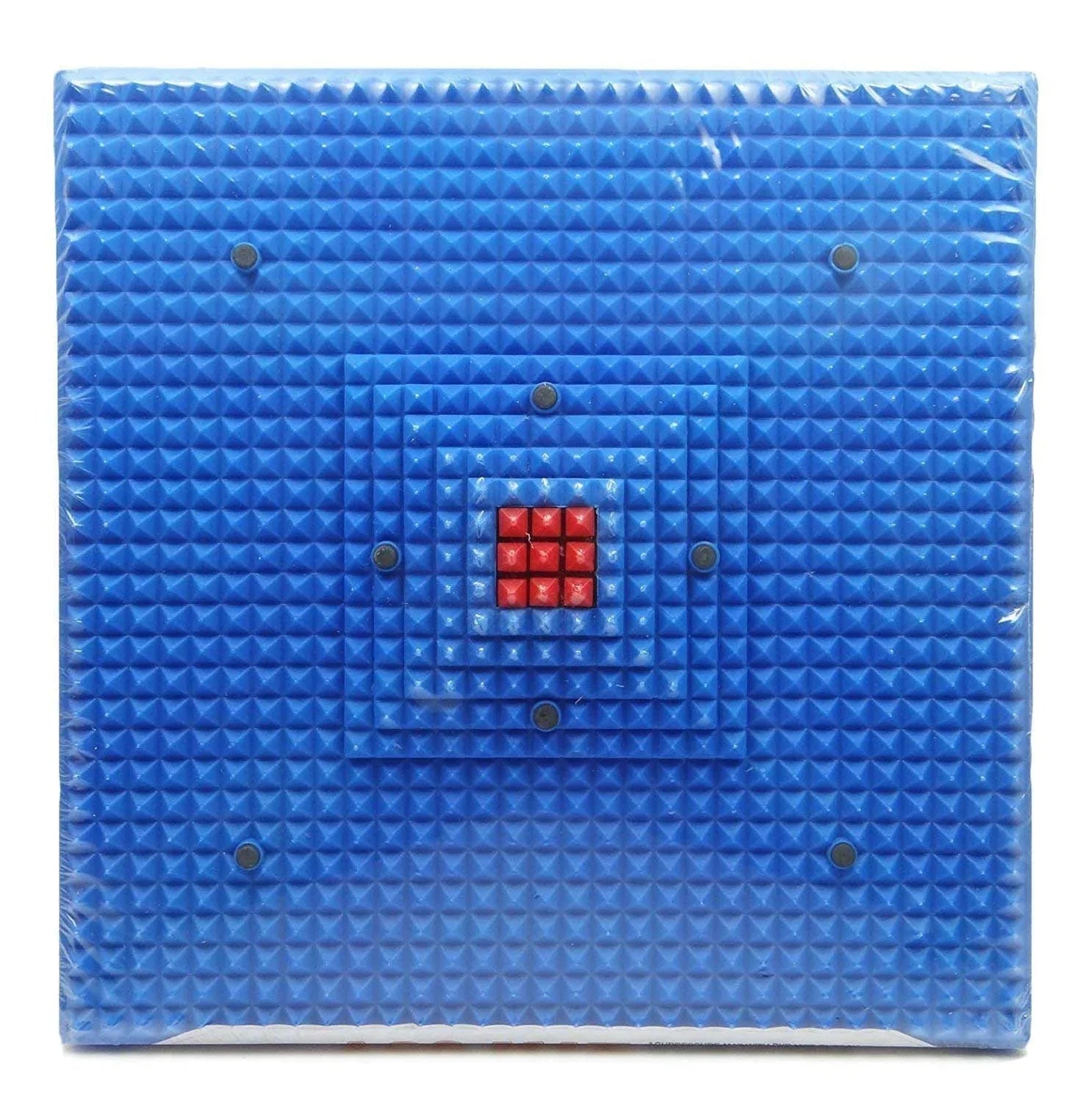 Blue acupressure foot mat with raised studs and red magnetic center