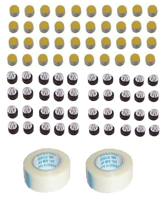 Acupressure magnet kit with round magnets and white adhesive tape rolls