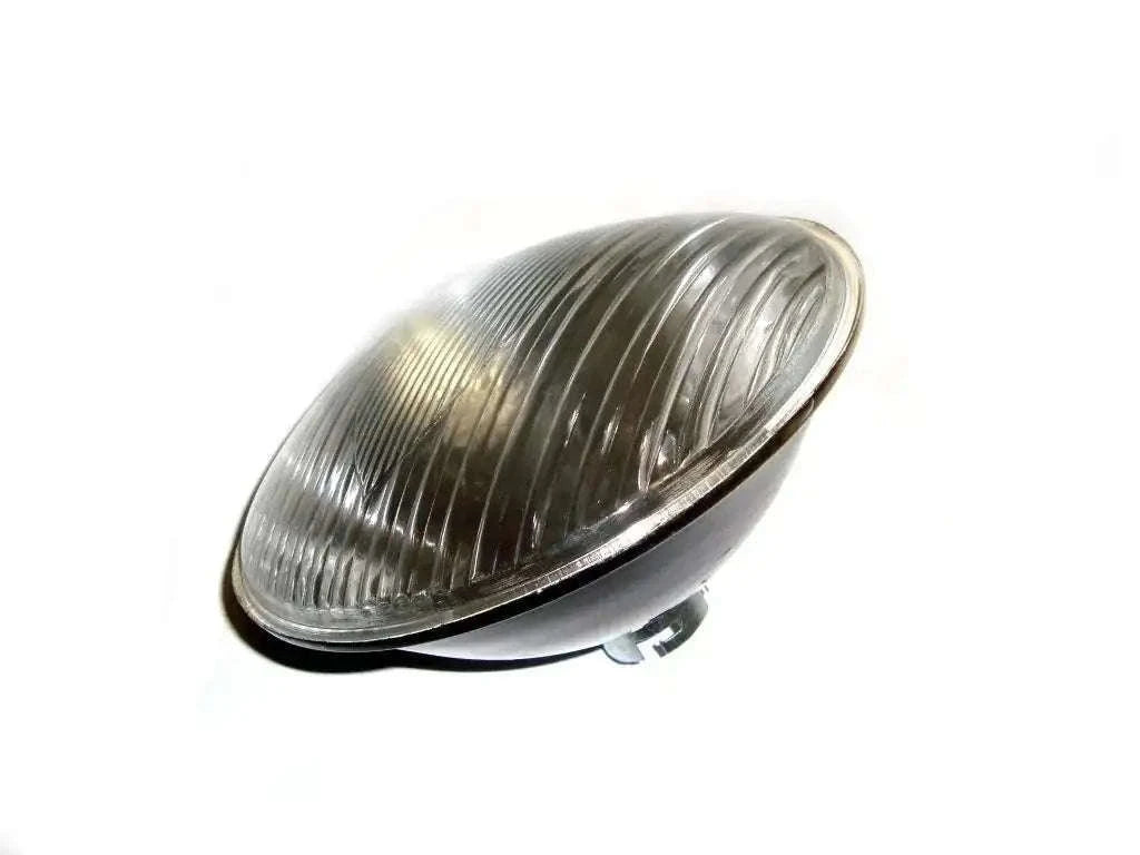 Sealed beam headlight assembly with parking bulb, clear oval lens and black base