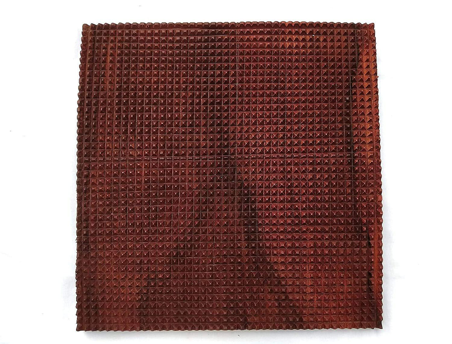 Brown acupressure wooden foot mat with raised square peg pattern