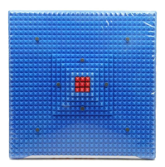 Blue acupressure reflexology foot mat with textured bumps and red magnetic center