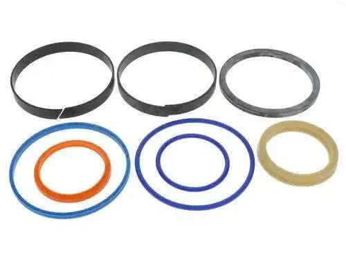 Hydraulic cylinder seal kit with black and blue rubber rings, orange core and beige seal