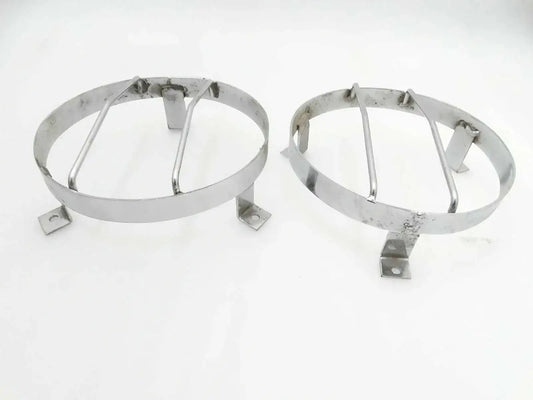Chrome plated external headlight grill guard pair, two round metal rings with brackets
