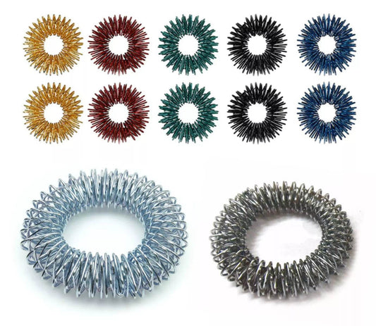 Acupressure massage bracelets set featuring colorful Sujok rings in various metal finishes for therapeutic relief