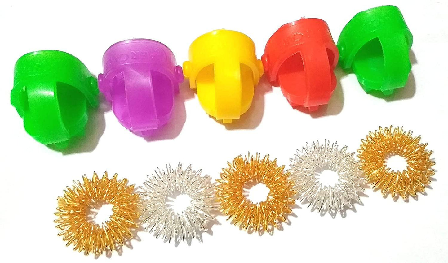 Colorful acupressure rings with spiked metal discs and thumb pad covers