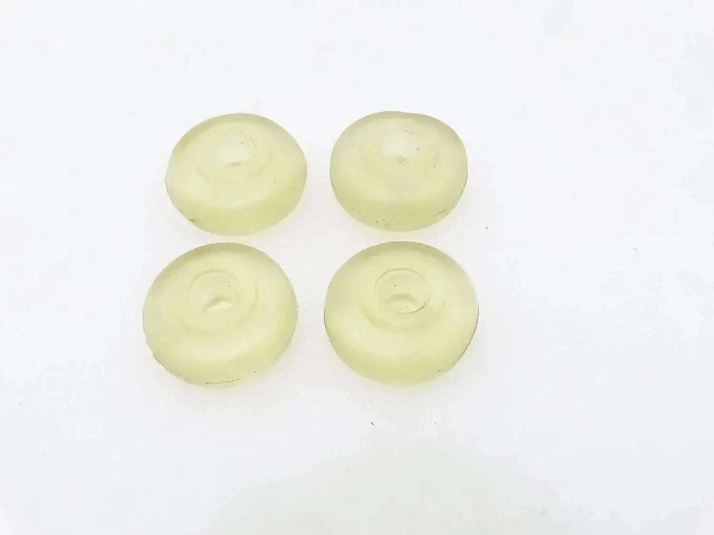 Car shocker bushings set of 4 light green circular pieces