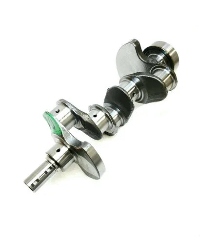 Tractor crankshaft shaft with machined metal journals and crank throws