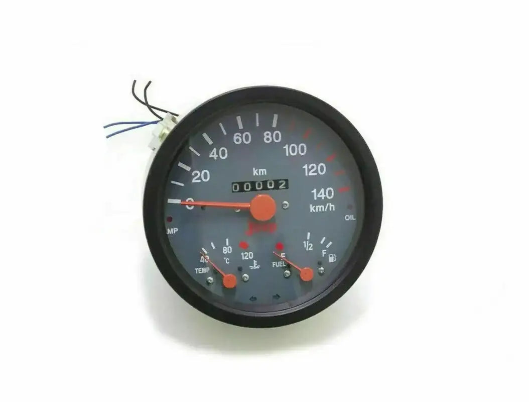 Round analog vehicle gauge cluster with black bezel, multiple needles and metric scale