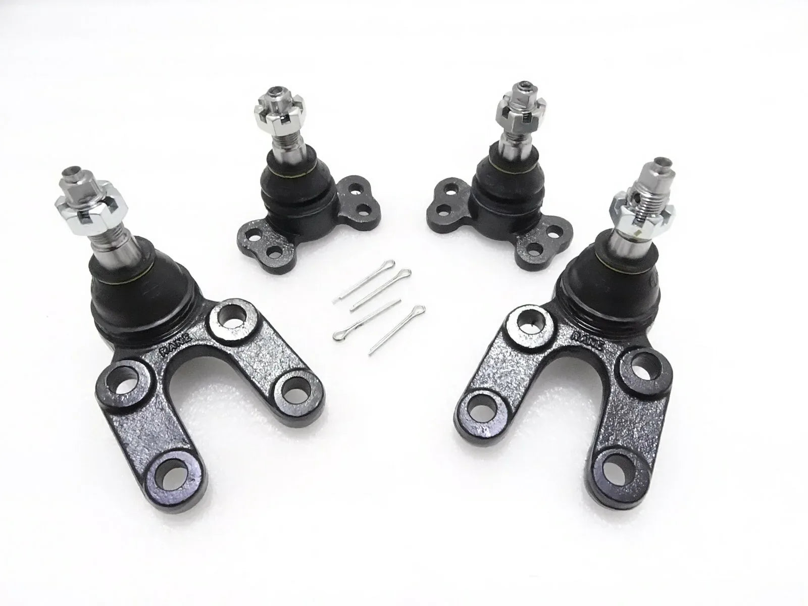 Suspension ball joint kit set with black rubber boots, metal arms, studs, and pins