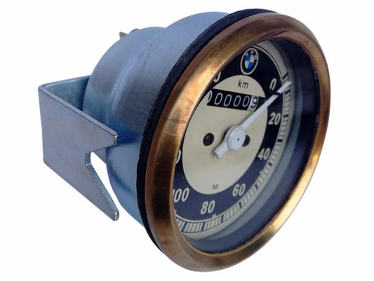 Vintage motorcycle speedometer with cream face, km scale, BMW logo, brass rim and black dial