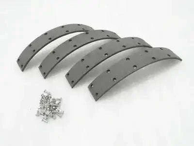 Rubberised brake lining segments with rivets, curved gray linings and rivets