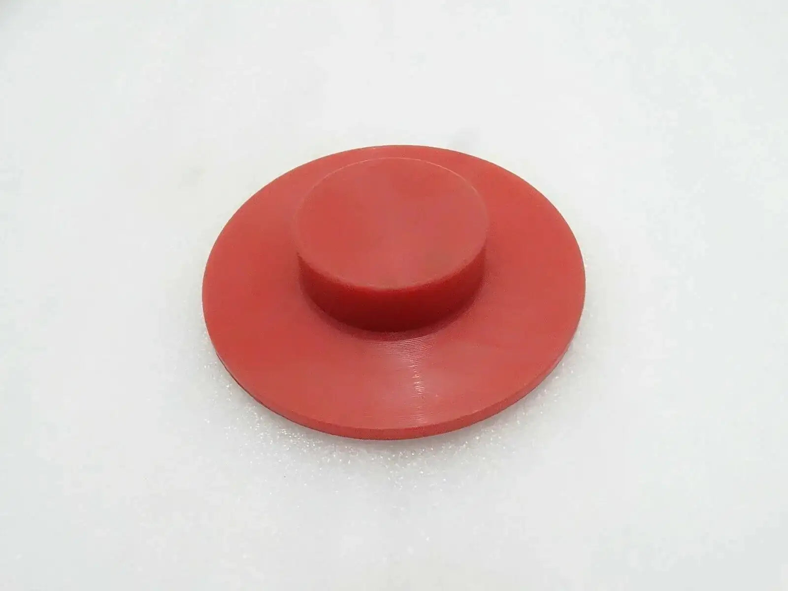 Red circular upper wear pad stabilizer with central stud