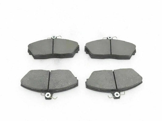 Disc brake pad set with four grey pads