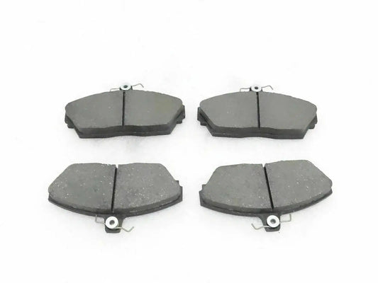 Disc brake pad set with four grey pads