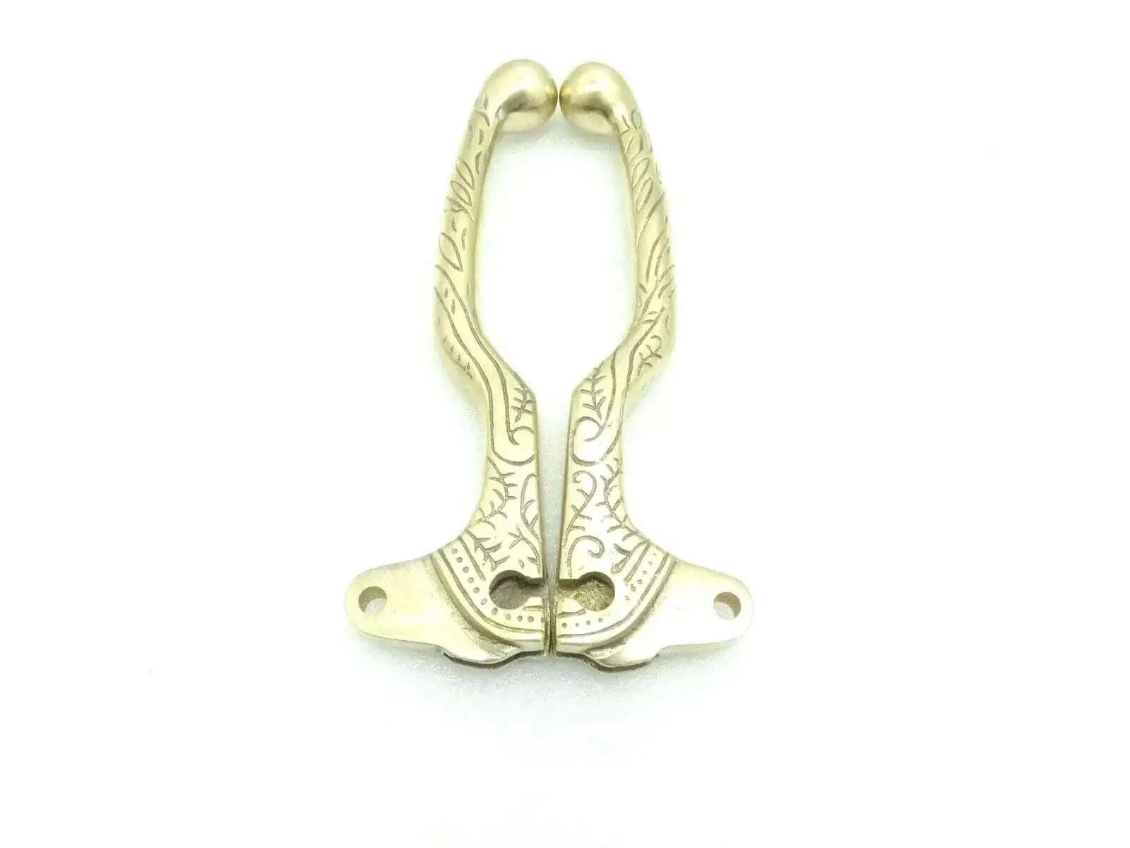 Brass engraved levers pair with decorative scrollwork