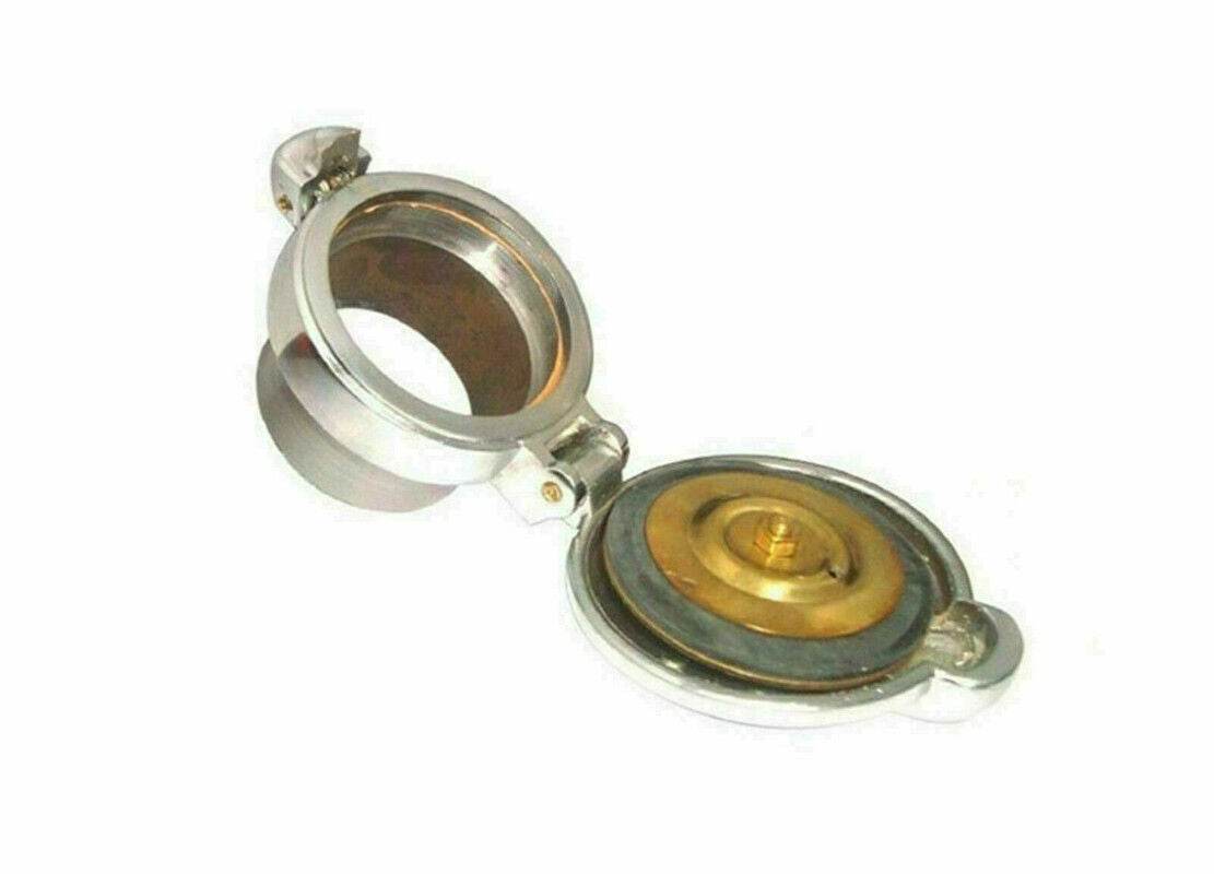 Cafe Racer Monza Cap with a polished silver finish and golden valve for motorcycles