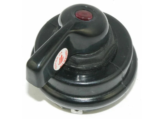 Black turn signal flasher switch with red indicator light, used for tractor turn signal bulb activation