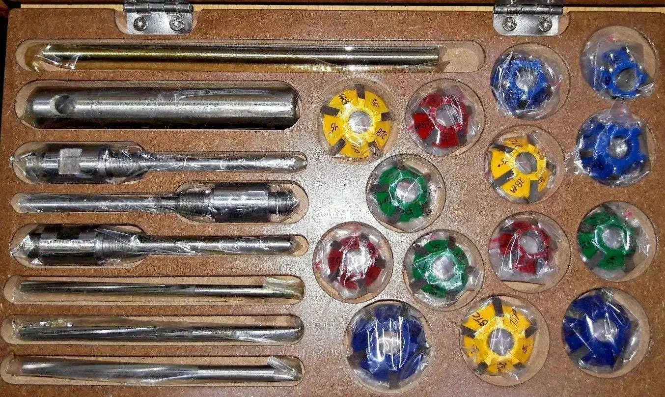 Valve seat cutter set with metal handles and colored carbide tips, 15-piece assortment
