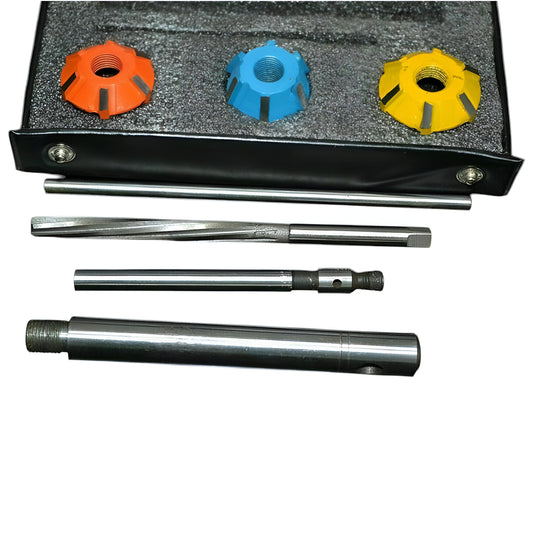 Carbide valve seat cutter set featuring three cutter heads and tools in a protective case for precision automotive work