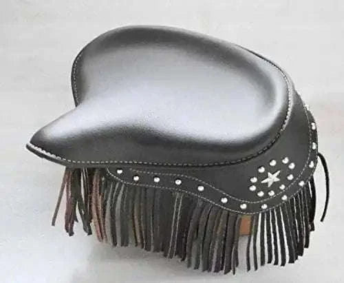Gray leather saddle seat with studded trim, star conchos, and long fringe