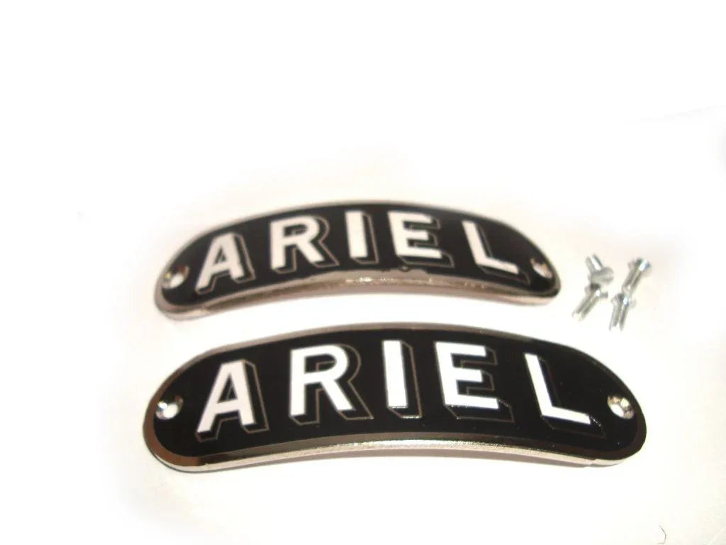 Pair of black Ariel decal emblems with chrome border and screws