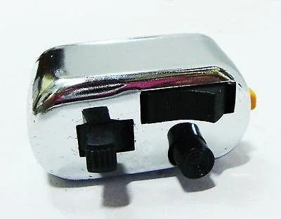 Chrome headlight switch with black connector terminals and adjustment knob