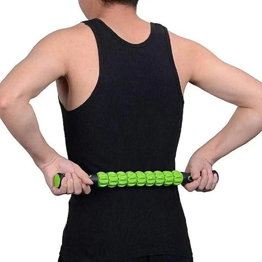 Green ridged deep tissue massage roller stick, held with black tank top