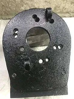 Metal pump housing plate with circular opening and multiple bolt holes
