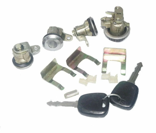 Vehicle lock kit with metal cylinders, brackets, clips, and two black keys