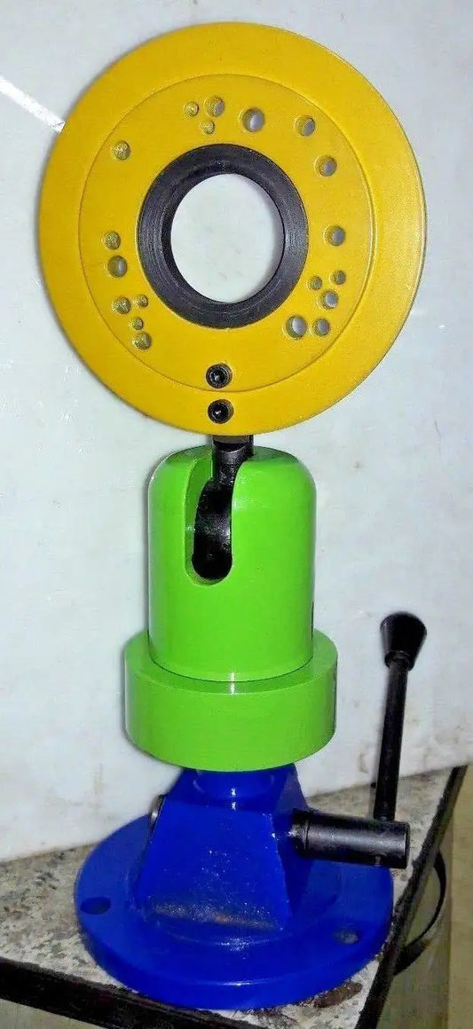 Universal ball joint vise with yellow spoked plate, green clamp, and blue base