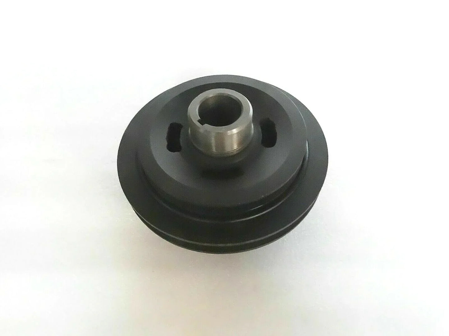 Crank pulley with central bore and grooves, dark metal