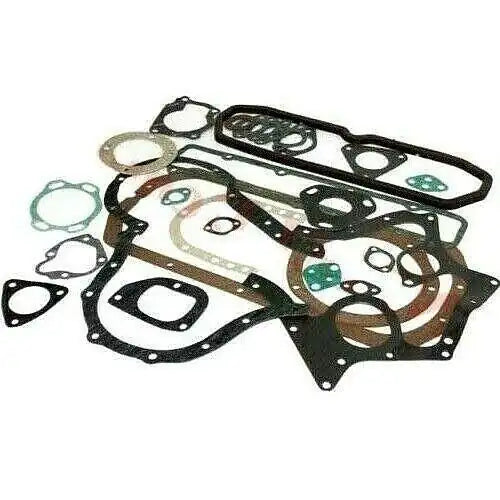 Engine overhauling gasket kit with multiple black and green seals, various shapes