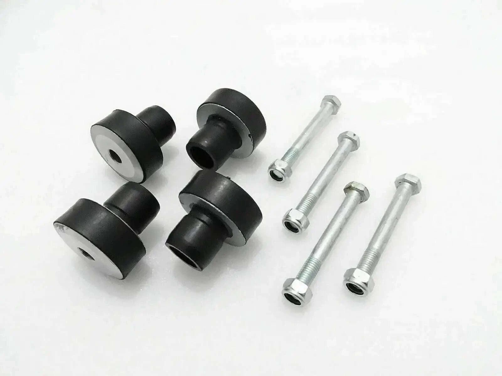 Engine mount bushing set with black rubber mounts and silver bolts, 4 pieces