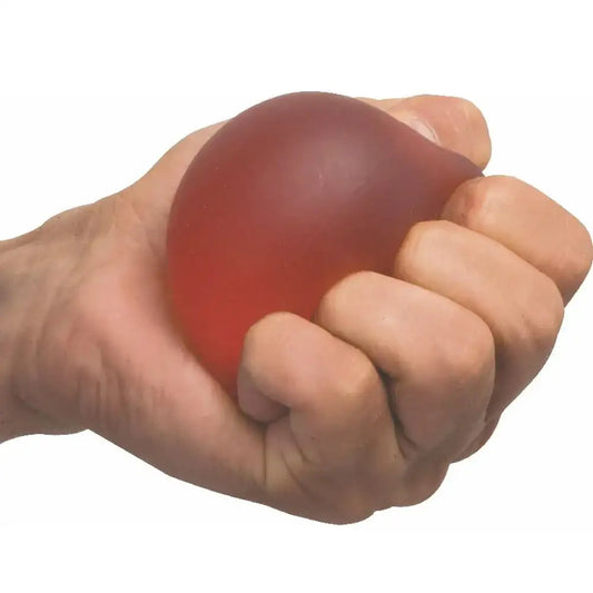 Red gel exercise ball held in two hands, round and flexible