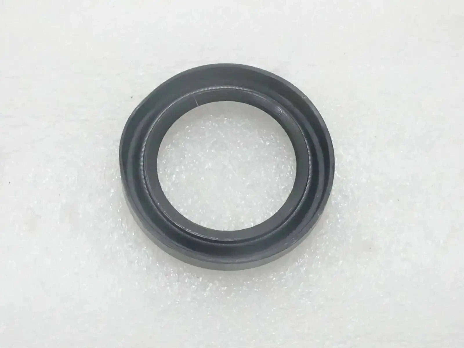 King pin seal, dark rubber ring with inner opening