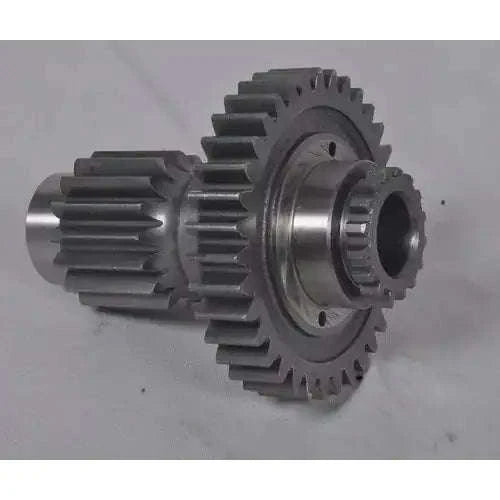 Metal tractor gear shaft with toothed countershaft gear, round flange and central bore