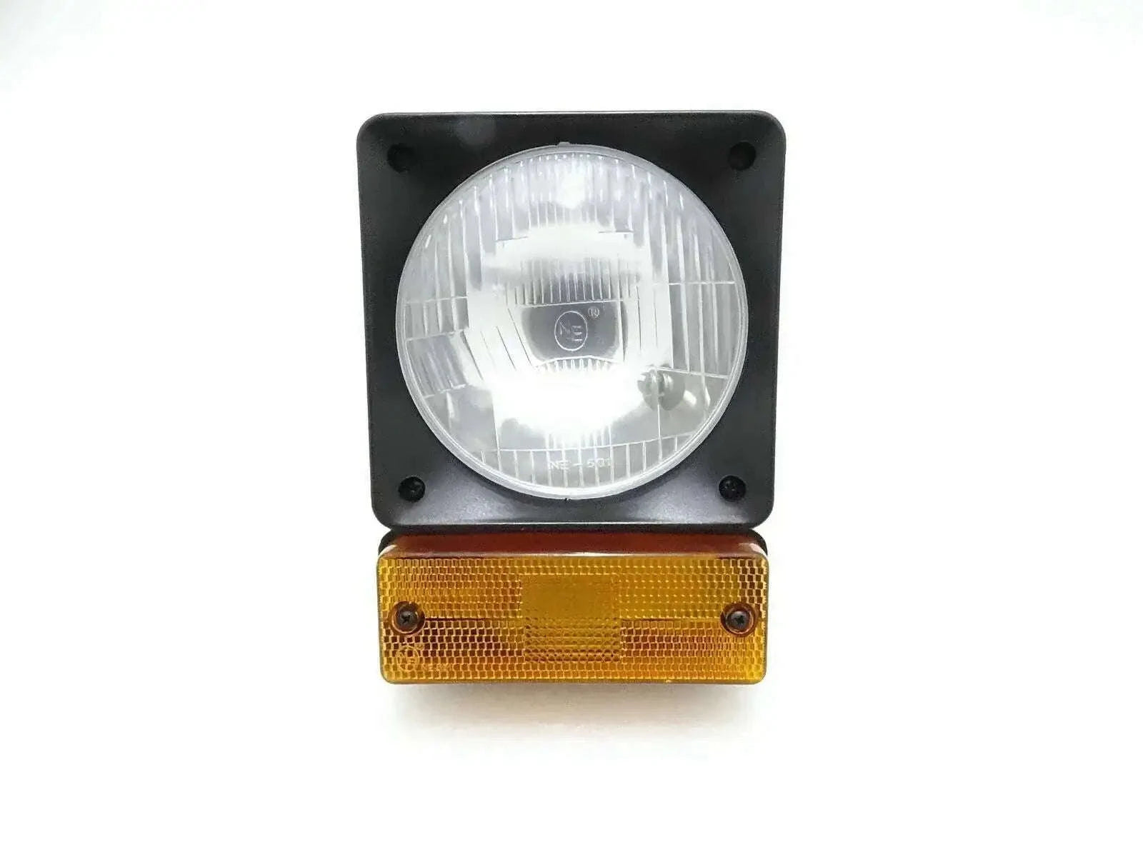 Front headlight and amber indicator light unit with round clear lens and black housing