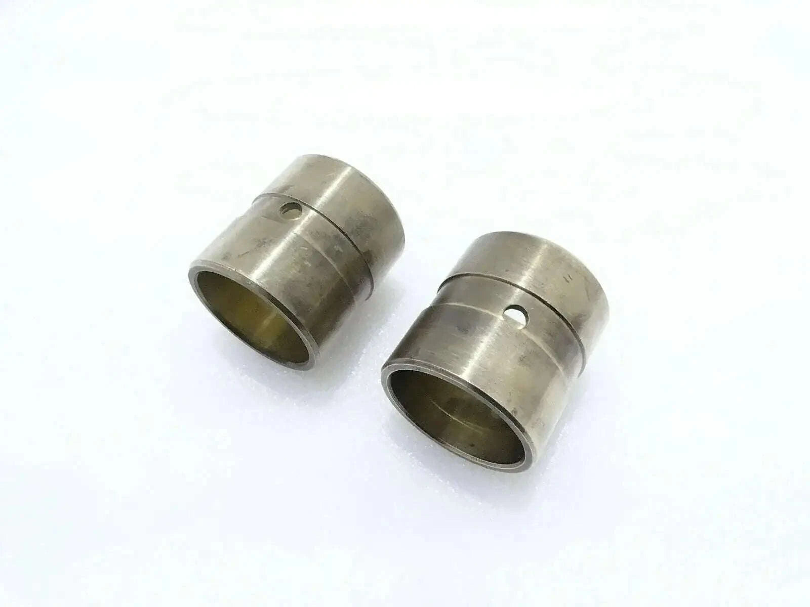 Pair of metal boom kingpost bushings, cylindrical with flange and central holes