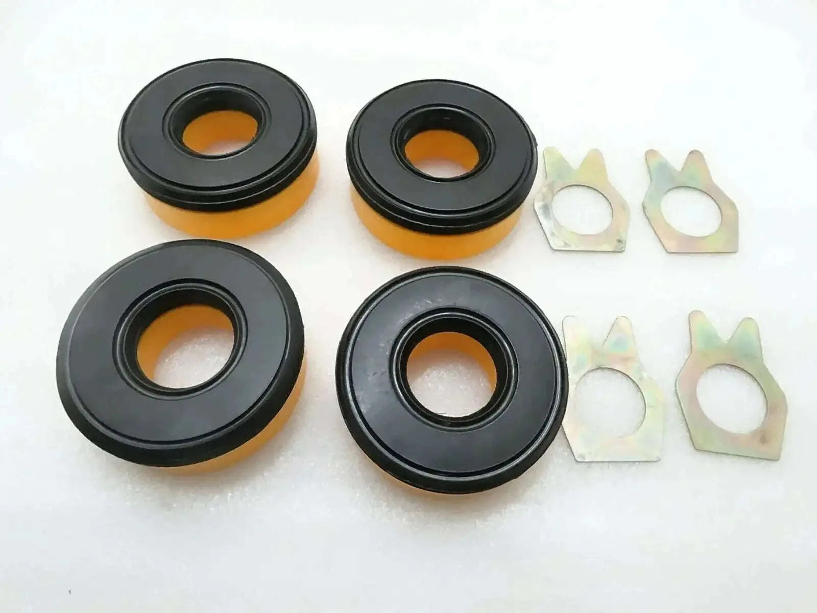 Hydraulic clamp seal kit with black rubber seals and metal clamp washers