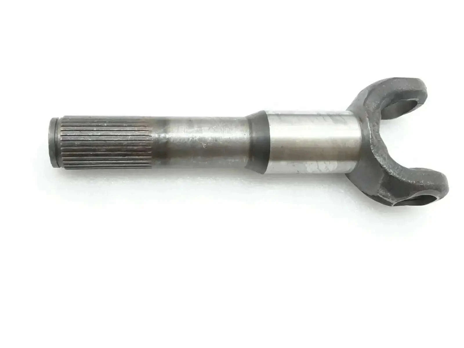Steel shaft hub side yoke with splined shaft end and forked connector