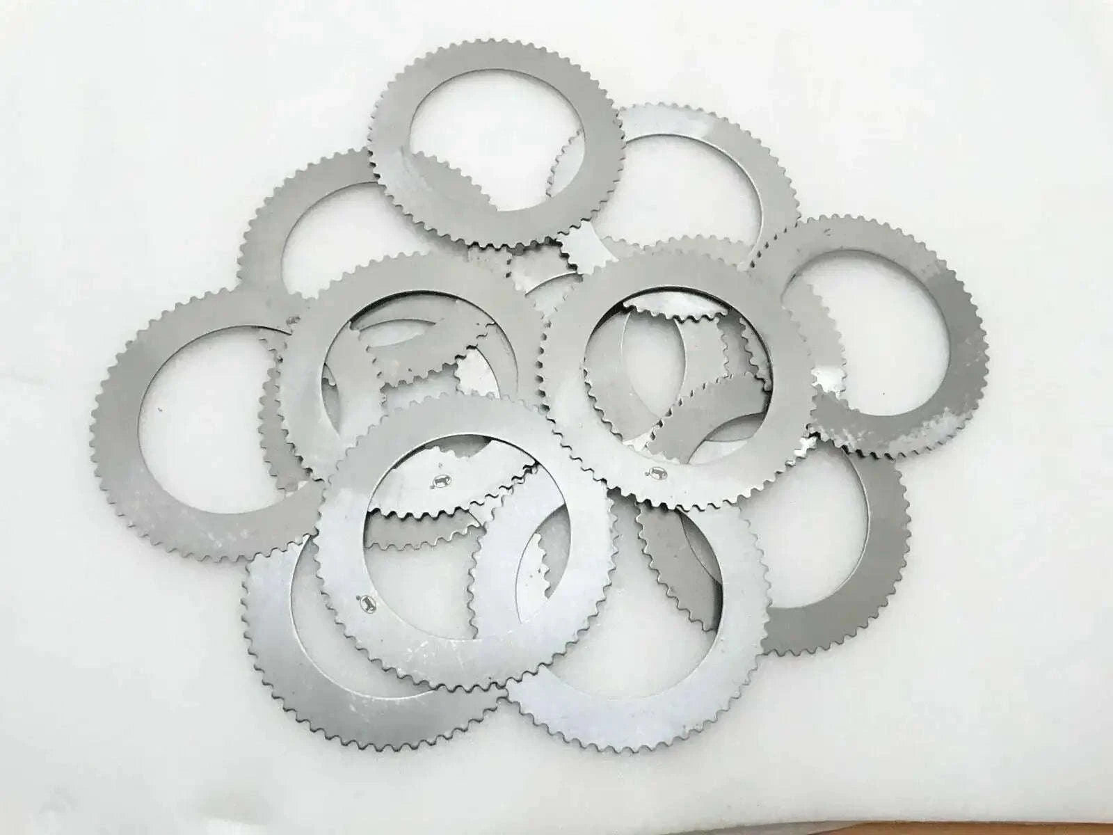 Transmission counter plates set of 14, silver metal gear-like rings