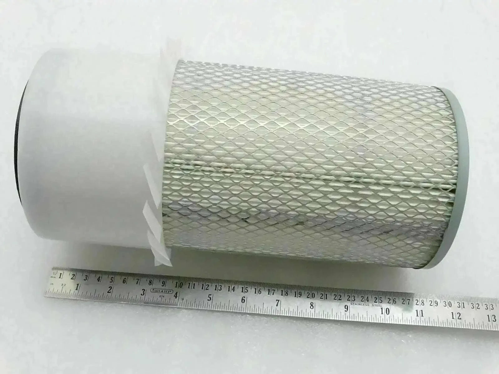 Cylindrical pleated air filter element with wire mesh, end caps